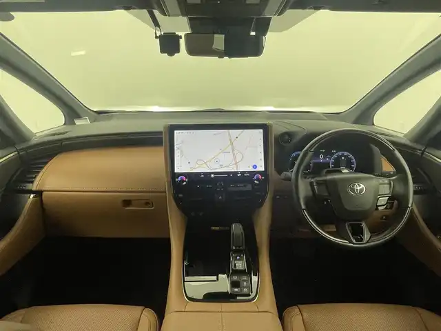 トヨタ ヴェルファイア ハイブリット Z プレミア 熊本県 2024(令6)年 1.9万km ブラック 禁煙車　/ワンオーナー　/純正１４インチディスプレイオーディオ　/HDMI/１２．１型フリップダウンモニター　/社外全方位ドライブレコーダー　/ビルトインETC2.0/両側パワースライドドア　/前席・2列目シートヒーター　/前席・2列目エアーシート　/前席パワーシート　/トヨタセーフティーセンス/・プリクラッシュセーフティ/・ロードサインアシスト/・フロントクロストラフィックアラート/・レーンディパーチャーアラート/・リヤクロストラフィックアラート/・レーダークルーズコントロール/横滑り防止/ブラインドスポットモニター/左右独立ガラスムーンルーフ/100V充電/置くだけ充電/ステアリングヒーター/パワーバックドア/ヘッドアップディスプレイ/デジタルインナーミラー/純正フロアマット/純正19インチAW/オートライト/オートマチックハイビーム/LEDヘッドライト/スマートキー/プッシュスタート/スペアキー1本/保証書/取扱説明書