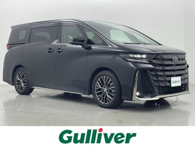 トヨタ ヴェルファイア ハイブリット Z プレミア 熊本県 2024(令6)年 1.9万km ブラック 禁煙車　/ワンオーナー　/純正１４インチディスプレイオーディオ　/HDMI/１２．１型フリップダウンモニター　/社外全方位ドライブレコーダー　/ビルトインETC2.0/両側パワースライドドア　/前席・2列目シートヒーター　/前席・2列目エアーシート　/前席パワーシート　/トヨタセーフティーセンス/・プリクラッシュセーフティ/・ロードサインアシスト/・フロントクロストラフィックアラート/・レーンディパーチャーアラート/・リヤクロストラフィックアラート/・レーダークルーズコントロール/横滑り防止/ブラインドスポットモニター/左右独立ガラスムーンルーフ/100V充電/置くだけ充電/ステアリングヒーター/パワーバックドア/ヘッドアップディスプレイ/デジタルインナーミラー/純正フロアマット/純正19インチAW/オートライト/オートマチックハイビーム/LEDヘッドライト/スマートキー/プッシュスタート/スペアキー1本/保証書/取扱説明書