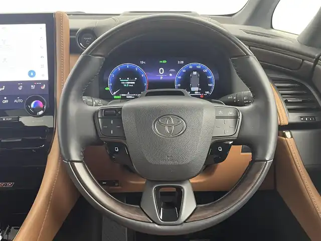 トヨタ ヴェルファイア ハイブリット Z プレミア 熊本県 2024(令6)年 1.9万km ブラック 禁煙車　/ワンオーナー　/純正１４インチディスプレイオーディオ　/HDMI/１２．１型フリップダウンモニター　/社外全方位ドライブレコーダー　/ビルトインETC2.0/両側パワースライドドア　/前席・2列目シートヒーター　/前席・2列目エアーシート　/前席パワーシート　/トヨタセーフティーセンス/・プリクラッシュセーフティ/・ロードサインアシスト/・フロントクロストラフィックアラート/・レーンディパーチャーアラート/・リヤクロストラフィックアラート/・レーダークルーズコントロール/横滑り防止/ブラインドスポットモニター/左右独立ガラスムーンルーフ/100V充電/置くだけ充電/ステアリングヒーター/パワーバックドア/ヘッドアップディスプレイ/デジタルインナーミラー/純正フロアマット/純正19インチAW/オートライト/オートマチックハイビーム/LEDヘッドライト/スマートキー/プッシュスタート/スペアキー1本/保証書/取扱説明書