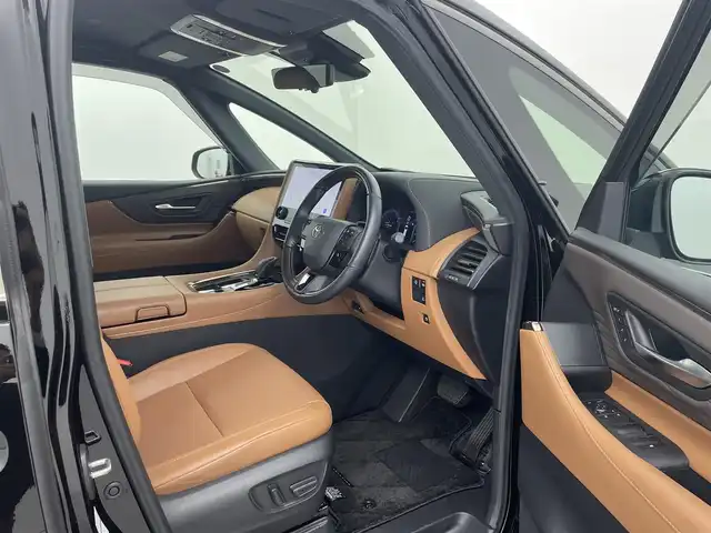 トヨタ ヴェルファイア ハイブリット Z プレミア 熊本県 2024(令6)年 1.9万km ブラック 禁煙車　/ワンオーナー　/純正１４インチディスプレイオーディオ　/HDMI/１２．１型フリップダウンモニター　/社外全方位ドライブレコーダー　/ビルトインETC2.0/両側パワースライドドア　/前席・2列目シートヒーター　/前席・2列目エアーシート　/前席パワーシート　/トヨタセーフティーセンス/・プリクラッシュセーフティ/・ロードサインアシスト/・フロントクロストラフィックアラート/・レーンディパーチャーアラート/・リヤクロストラフィックアラート/・レーダークルーズコントロール/横滑り防止/ブラインドスポットモニター/左右独立ガラスムーンルーフ/100V充電/置くだけ充電/ステアリングヒーター/パワーバックドア/ヘッドアップディスプレイ/デジタルインナーミラー/純正フロアマット/純正19インチAW/オートライト/オートマチックハイビーム/LEDヘッドライト/スマートキー/プッシュスタート/スペアキー1本/保証書/取扱説明書