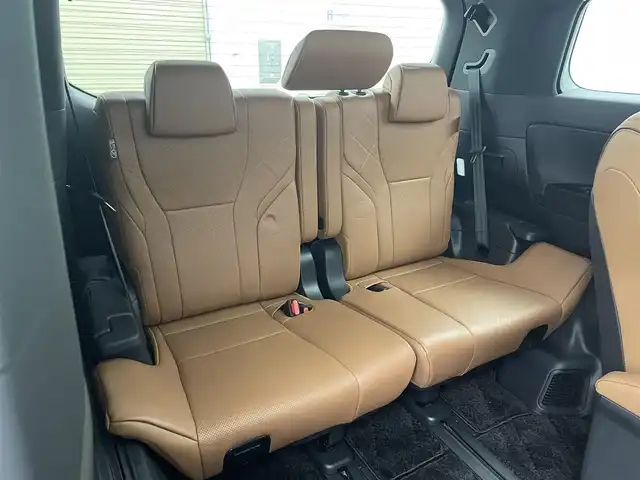 トヨタ ヴェルファイア ハイブリット Z プレミア 熊本県 2024(令6)年 1.9万km ブラック 禁煙車　/ワンオーナー　/純正１４インチディスプレイオーディオ　/HDMI/１２．１型フリップダウンモニター　/社外全方位ドライブレコーダー　/ビルトインETC2.0/両側パワースライドドア　/前席・2列目シートヒーター　/前席・2列目エアーシート　/前席パワーシート　/トヨタセーフティーセンス/・プリクラッシュセーフティ/・ロードサインアシスト/・フロントクロストラフィックアラート/・レーンディパーチャーアラート/・リヤクロストラフィックアラート/・レーダークルーズコントロール/横滑り防止/ブラインドスポットモニター/左右独立ガラスムーンルーフ/100V充電/置くだけ充電/ステアリングヒーター/パワーバックドア/ヘッドアップディスプレイ/デジタルインナーミラー/純正フロアマット/純正19インチAW/オートライト/オートマチックハイビーム/LEDヘッドライト/スマートキー/プッシュスタート/スペアキー1本/保証書/取扱説明書