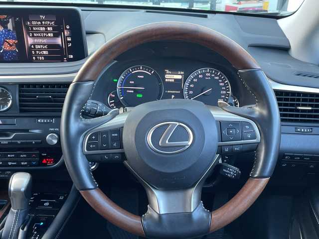 レクサス ＲＸ 450hL 千葉県 2022(令4)年 2.9万km グラファイトブラックガラスフレーク 純正メーカーOP12.3インチナビ/(フルセグTV/BT/CD/DVD/FM/AM)/全周囲カメラ/ヘッドアップディスプレイ/ブラインドスポットモニター/衝突被害軽減システム/車線逸脱警報/追従式クルーズコントロール/レザーシート/横滑り防止装置/ビルトインETC2.0/アイドリングストップ/LEDヘッドライト/フォグランプ/オートライト/ウィンカーミラー/電動格納ミラー/純正20インチAW/シートヒーター/エアシート/シートリフター/ステアリングヒーター/パドルシフト/プッシュスタート/スマートキー/フロアマット/スペアキー/取扱説明書/保証書