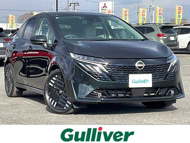 日産 オーラ G FOUR レザーエディション 道央・札幌 2024(令6)年 0.2万km パープル ４WD/寒冷地仕様/BOSEサウンドシステム/純正メーカーナビ/AM/FM/USB/BT/プロパイロット/エマージェンシーブレーキ/横滑り防止装置/レーダークルーズコントロール/レーンキープアシスト/クリアランスソナー/アラウンドビューモニター/ビルトインETC2.0/デジタルインナーミラー/EVMODE/D-MODE/D席パワーシート/前席シートヒーター/レザーシート/革巻きステアリング/ステアリングリモコン/ハンドルヒーター/電動パーキング/オートブレーキホールド/置くだけ充電/プッシュスタート/スマートキー/LEDヘッドライト/オートライト/オートハイビーム/フォグランプ/電動格納ミラー/ウィンカーミラー/純正フロアマット