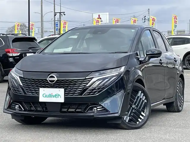 日産 オーラ G FOUR レザーエディション 道央・札幌 2024(令6)年 0.2万km パープル ４WD/寒冷地仕様/BOSEサウンドシステム/純正メーカーナビ/AM/FM/USB/BT/プロパイロット/エマージェンシーブレーキ/横滑り防止装置/レーダークルーズコントロール/レーンキープアシスト/クリアランスソナー/アラウンドビューモニター/ビルトインETC2.0/デジタルインナーミラー/EVMODE/D-MODE/D席パワーシート/前席シートヒーター/レザーシート/革巻きステアリング/ステアリングリモコン/ハンドルヒーター/電動パーキング/オートブレーキホールド/置くだけ充電/プッシュスタート/スマートキー/LEDヘッドライト/オートライト/オートハイビーム/フォグランプ/電動格納ミラー/ウィンカーミラー/純正フロアマット