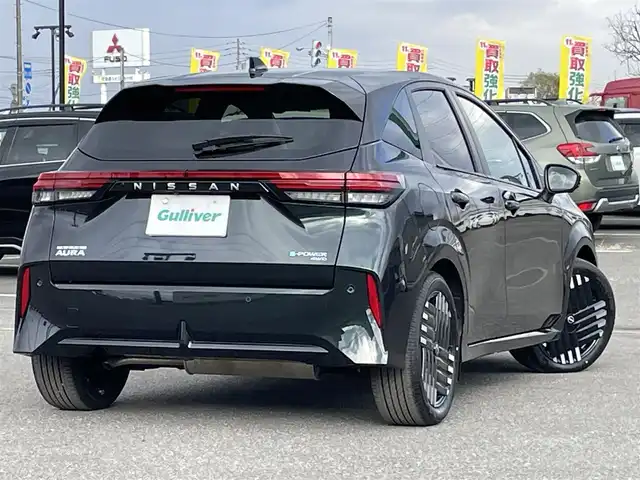 日産 オーラ G FOUR レザーエディション 道央・札幌 2024(令6)年 0.2万km パープル ４WD/寒冷地仕様/BOSEサウンドシステム/純正メーカーナビ/AM/FM/USB/BT/プロパイロット/エマージェンシーブレーキ/横滑り防止装置/レーダークルーズコントロール/レーンキープアシスト/クリアランスソナー/アラウンドビューモニター/ビルトインETC2.0/デジタルインナーミラー/EVMODE/D-MODE/D席パワーシート/前席シートヒーター/レザーシート/革巻きステアリング/ステアリングリモコン/ハンドルヒーター/電動パーキング/オートブレーキホールド/置くだけ充電/プッシュスタート/スマートキー/LEDヘッドライト/オートライト/オートハイビーム/フォグランプ/電動格納ミラー/ウィンカーミラー/純正フロアマット