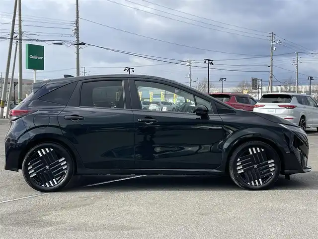 日産 オーラ G FOUR レザーエディション 道央・札幌 2024(令6)年 0.2万km パープル ４WD/寒冷地仕様/BOSEサウンドシステム/純正メーカーナビ/AM/FM/USB/BT/プロパイロット/エマージェンシーブレーキ/横滑り防止装置/レーダークルーズコントロール/レーンキープアシスト/クリアランスソナー/アラウンドビューモニター/ビルトインETC2.0/デジタルインナーミラー/EVMODE/D-MODE/D席パワーシート/前席シートヒーター/レザーシート/革巻きステアリング/ステアリングリモコン/ハンドルヒーター/電動パーキング/オートブレーキホールド/置くだけ充電/プッシュスタート/スマートキー/LEDヘッドライト/オートライト/オートハイビーム/フォグランプ/電動格納ミラー/ウィンカーミラー/純正フロアマット