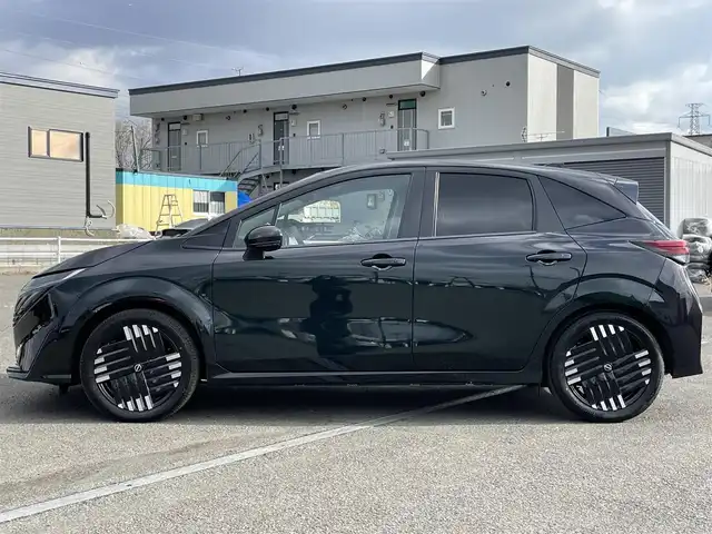 日産 オーラ G FOUR レザーエディション 道央・札幌 2024(令6)年 0.2万km パープル ４WD/寒冷地仕様/BOSEサウンドシステム/純正メーカーナビ/AM/FM/USB/BT/プロパイロット/エマージェンシーブレーキ/横滑り防止装置/レーダークルーズコントロール/レーンキープアシスト/クリアランスソナー/アラウンドビューモニター/ビルトインETC2.0/デジタルインナーミラー/EVMODE/D-MODE/D席パワーシート/前席シートヒーター/レザーシート/革巻きステアリング/ステアリングリモコン/ハンドルヒーター/電動パーキング/オートブレーキホールド/置くだけ充電/プッシュスタート/スマートキー/LEDヘッドライト/オートライト/オートハイビーム/フォグランプ/電動格納ミラー/ウィンカーミラー/純正フロアマット