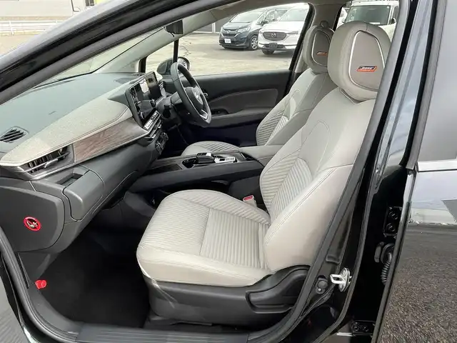 日産 オーラ G FOUR レザーエディション 道央・札幌 2024(令6)年 0.2万km パープル ４WD/寒冷地仕様/BOSEサウンドシステム/純正メーカーナビ/AM/FM/USB/BT/プロパイロット/エマージェンシーブレーキ/横滑り防止装置/レーダークルーズコントロール/レーンキープアシスト/クリアランスソナー/アラウンドビューモニター/ビルトインETC2.0/デジタルインナーミラー/EVMODE/D-MODE/D席パワーシート/前席シートヒーター/レザーシート/革巻きステアリング/ステアリングリモコン/ハンドルヒーター/電動パーキング/オートブレーキホールド/置くだけ充電/プッシュスタート/スマートキー/LEDヘッドライト/オートライト/オートハイビーム/フォグランプ/電動格納ミラー/ウィンカーミラー/純正フロアマット