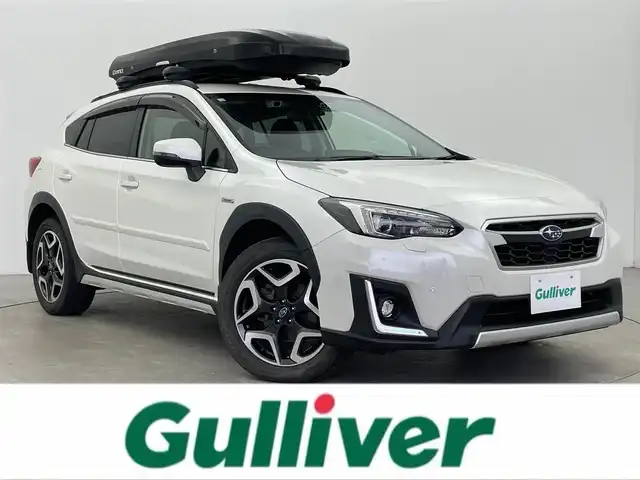 スバル ＸＶ ハイブリッド アドバンス 富山県 2018(平30)年 6万km クリスタルホワイトP 純正ナビ（AM/FM/DVD/BT/フルセグ）/バック/サイドカメラ/ドライブレコーダー/ETC/ハーフレザーシート/D/N席パワーシート/ブラインドスポットモニター/衝突被害軽減システム/レーダークルーズコントロール/レーンキープアシスト/コーナーセンサー/横滑り防止装置/純正アルミホイール/純正フロアマット/オートLEDライト/フォグライト/オートホールド付電子パーキング/INNOルーフボックス/革巻きステアリング/ステアリングスイッチ/パドルシフト/スマートキー/スペアキー