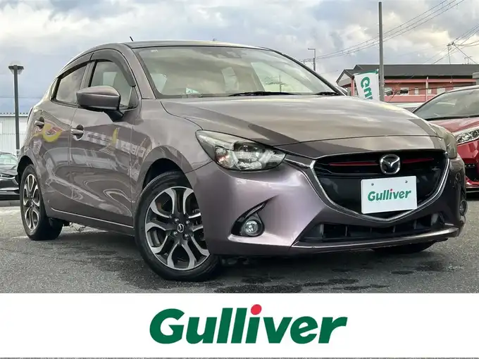 新着情報“デミオXDツーリング Lパッケージ”2014年式スモーキーローズマイカ入荷しました！