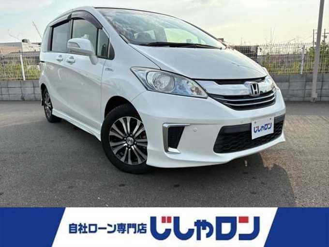 新着情報“フリードハイブリッドハイブリッド・ジャストセレクション”2014年式ホワイトオーキッドパール入荷しました！
