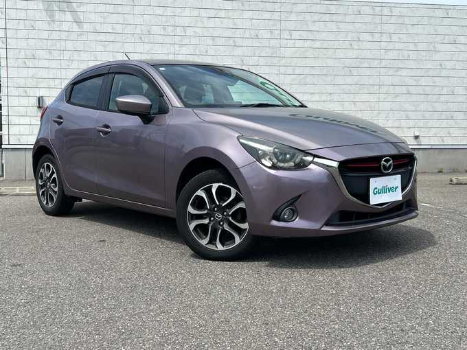 新着情報“デミオXDツーリング”2015年式スモーキーローズマイカ入荷しました！