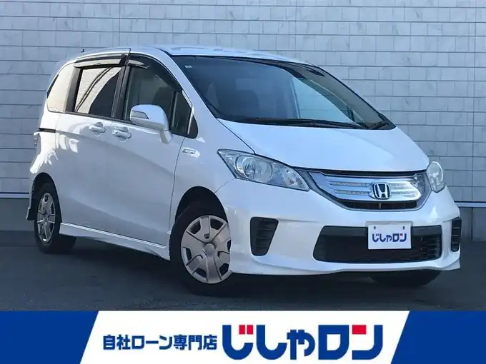 新着情報“フリードハイブリッドハイブリッド・ジャストセレクション”2013年式ホワイトオーキッドパール入荷しました！