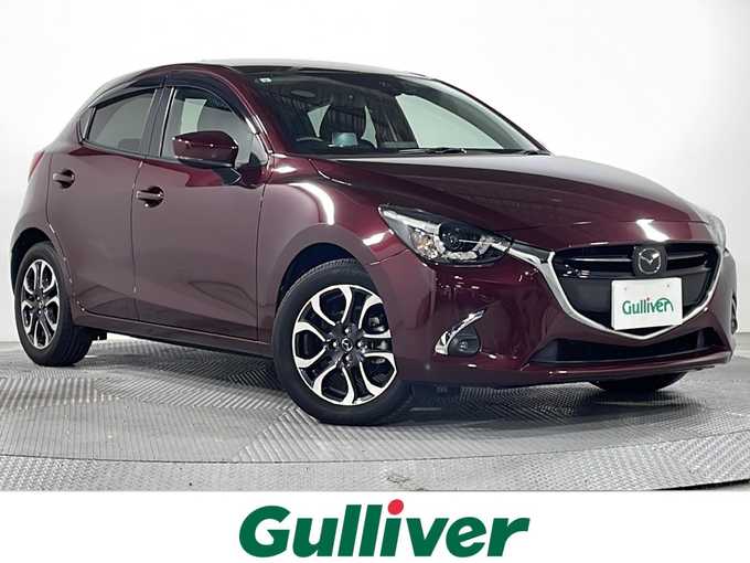 新着情報“デミオXDツーリング”2017年式ディープクリムゾンマイカ入荷しました！