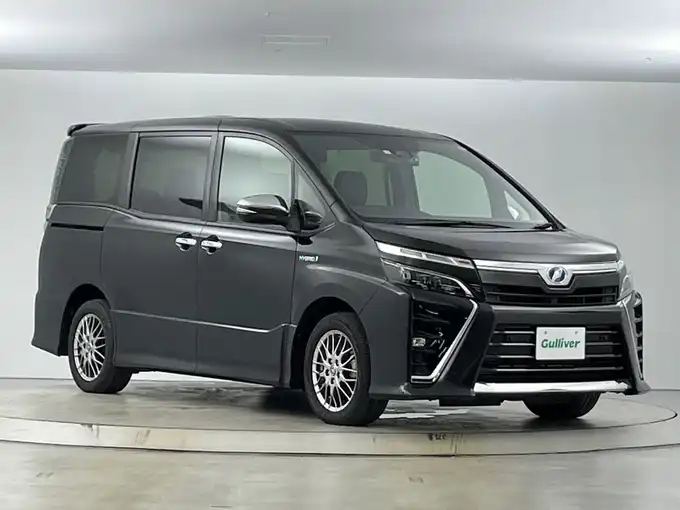 新着情報“ヴォクシーハイブリッドZS 煌Ⅱ”2019年式イナズマスパーキングブラックガラスフレーク入荷しました！