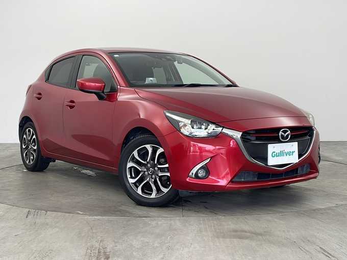 新着情報“デミオ13Sツーリング”2016年式ソウルレッドプレミアムメタリック入荷しました！