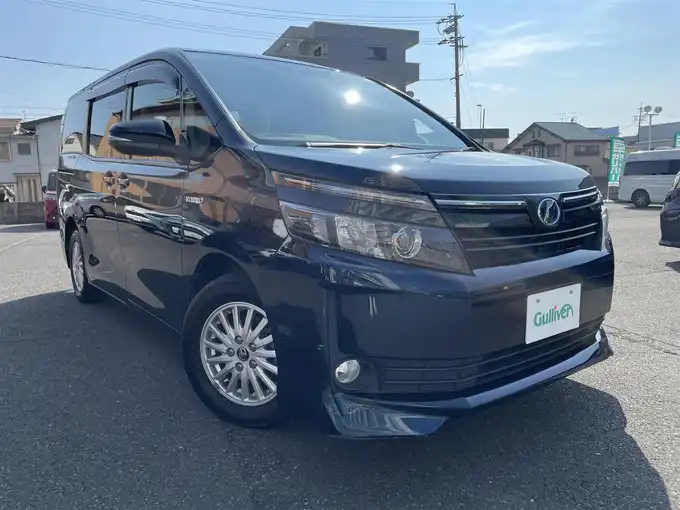 新着情報“ヴォクシーハイブリッドX”2014年式ブラッキッシュアゲハガラスフレーク入荷しました！