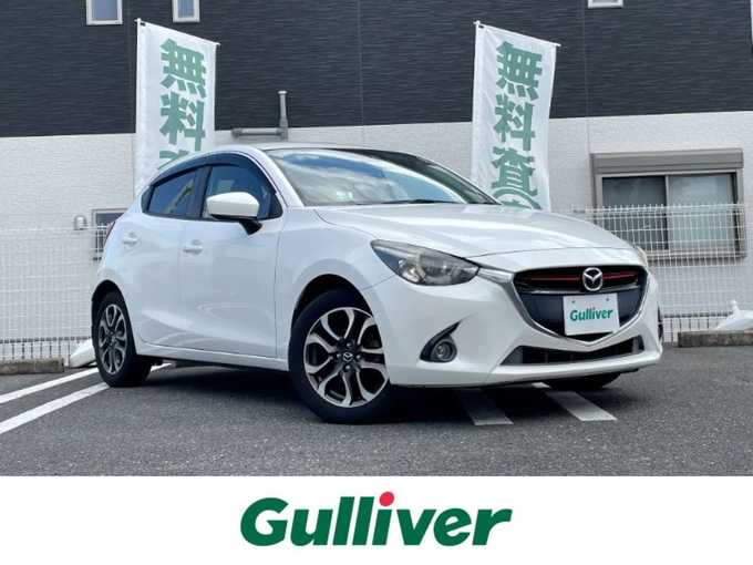 新着情報“デミオXDツーリング”2016年式スノーフレイクホワイトパールマイカ入荷しました！