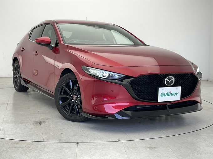 新着情報“ＭＡＺＤＡ３ファストバック20S 100周年特別記念車”2021年式ソウルレッドクリスタルM入荷しました！