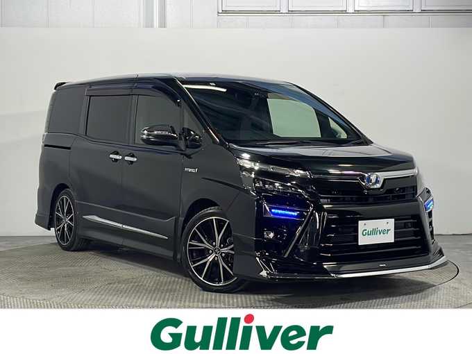 新着情報“ヴォクシーハイブリッドZS 煌Ⅱ”2019年式イナズマスパーキングブラックガラスフレーク入荷しました！