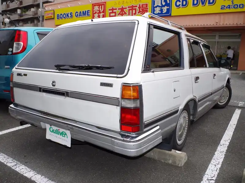 カタログ画像：セドリックワゴン（CEDRIC WAGON） Ｖ２０Ｅ ＳＧＬリミテッド 1997年8月 E-WY30 2000cc ホワイトパールツートーン（３Ｐ）（スーパーファインハードコート） 燃費9.4km / l  バック