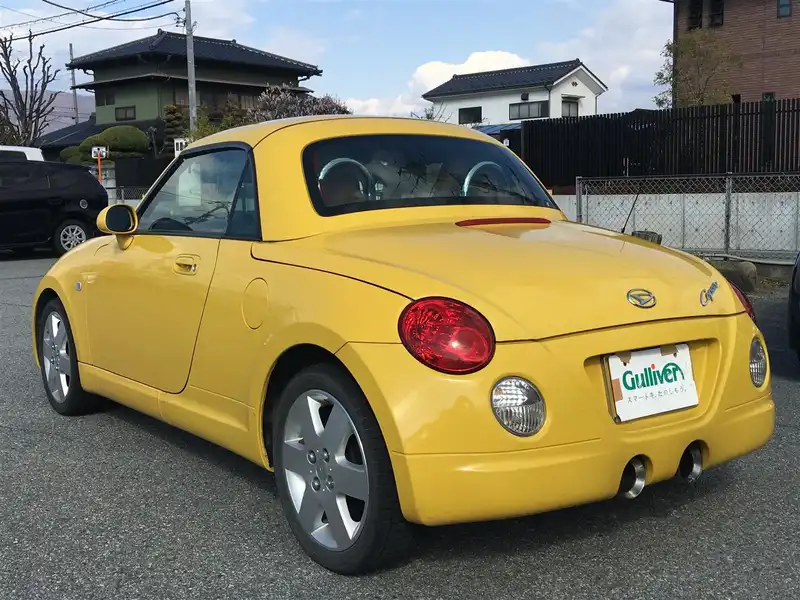 カタログ画像：コペン（COPEN） タンレザーエディション 2008年12月 ABA-L880K 660cc ＤＣ・ジョーヌイエロー 燃費15.2km / l  バック