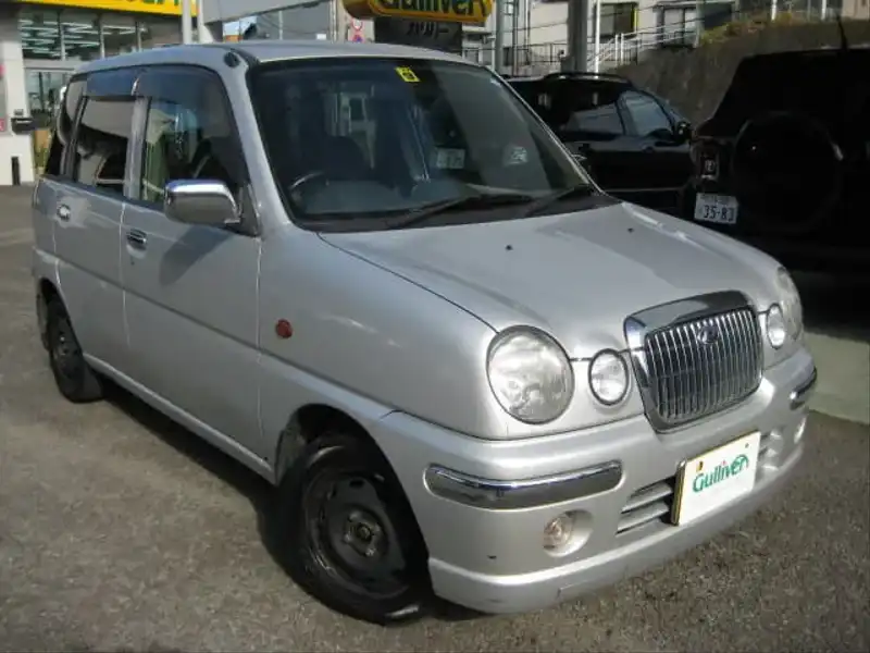 カタログ画像：プレオ・ネスタ（PLEO NESTA） Ｅ 2002年10月 TA-RA1 660cc シャイニーシルバー・メタリック 燃費20.0km / l  メイン