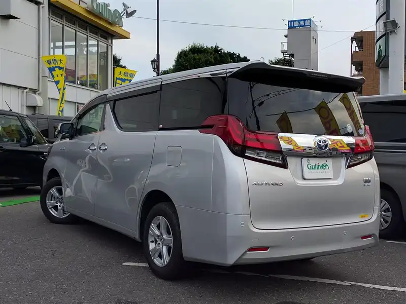 カタログ画像：アルファードハイブリッド（ALPHARD HYBRID） ハイブリッドＸ 2015年1月 DAA-AYH30W 2500cc シルバーメタリック 燃費19.4km / l バック