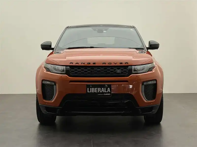 カタログ画像：レンジローバーイヴォーク（RANGE ROVER EVOQUE） アランチョ・ネロエディション 2017年6月 CBA-LV2A 2000cc フェニックスオレンジ 燃費10.6km / l フロント