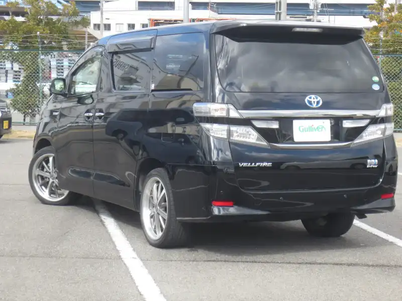 カタログ画像：ヴェルファイアハイブリッド（VELLFIRE HYBRID） ハイブリッドＸ サイドリフトアップシート装着車 2012年9月 DAA-ATH20W 2400cc ブラック 燃費16.2km / l バック