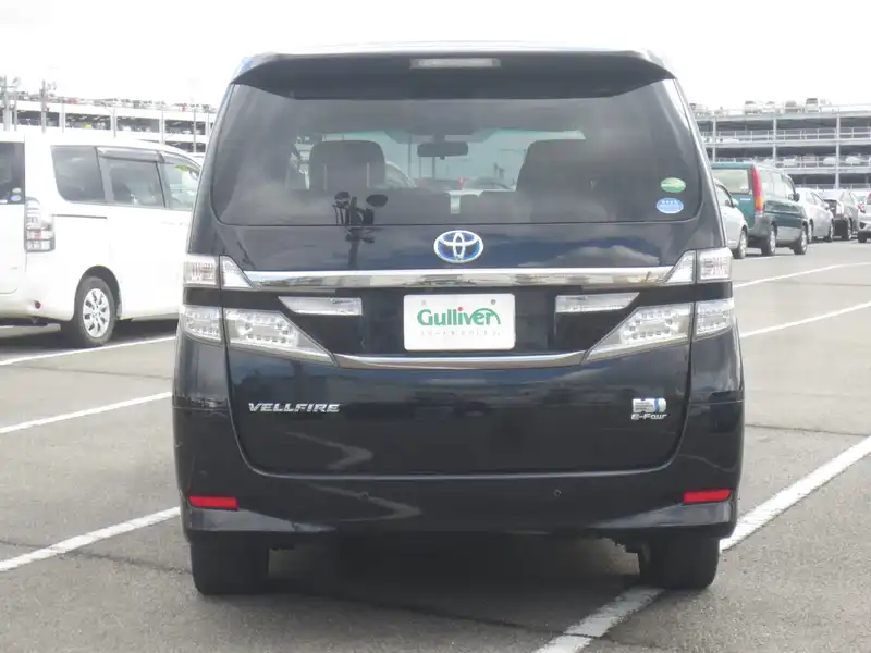 カタログ画像：ヴェルファイアハイブリッド（VELLFIRE HYBRID） ハイブリッドＸ サイドリフトアップシート装着車 2011年11月 DAA-ATH20W 2400cc ブラック 燃費16.2km / l バック