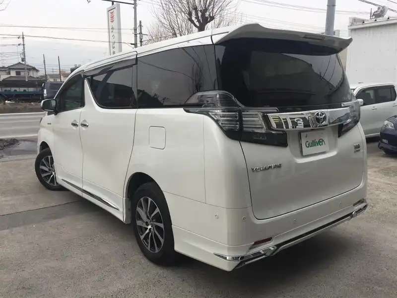 カタログ画像：ヴェルファイアハイブリッド（VELLFIRE HYBRID） ハイブリッドＶ 2015年1月 DAA-AYH30W 2500cc ホワイトパールクリスタルシャイン 燃費18.4km / l バック