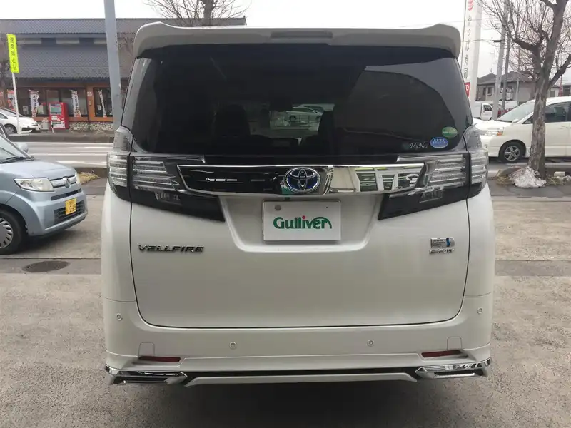 カタログ画像：ヴェルファイアハイブリッド（VELLFIRE HYBRID） ハイブリッドＶ 2015年1月 DAA-AYH30W 2500cc ホワイトパールクリスタルシャイン 燃費18.4km / l バック