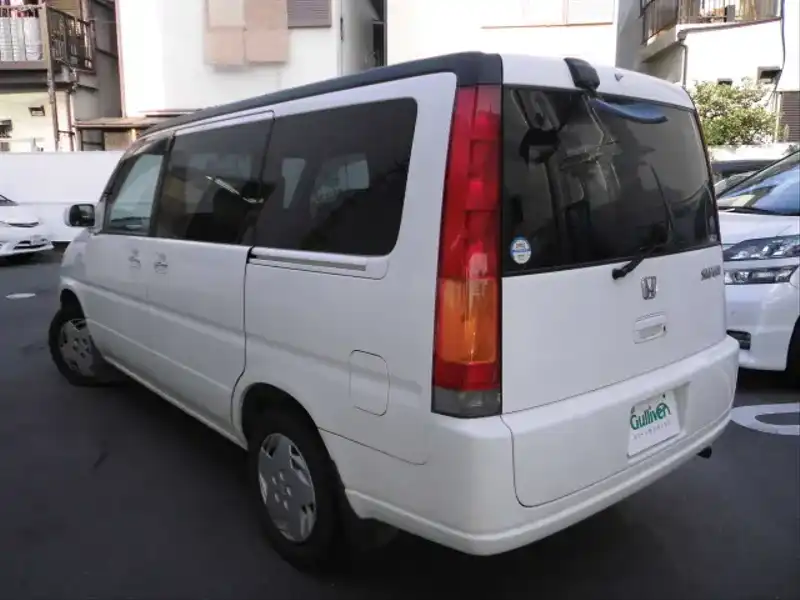 カタログ画像：ステップワゴン（STEPWAGON） Ｇ フィールドデッキ ポップアップシート 2000年8月 GF-RF1 2000cc タフタホワイト 燃費10.6km / l  バック