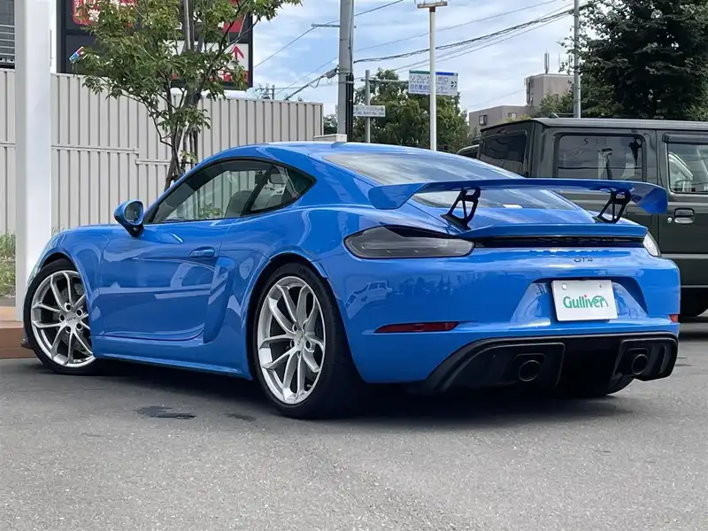 カタログ画像：７１８ケイマン（718 CAYMAN） ７１８ケイマンＧＴ４ 2022年6月 7BA-982L40 4000cc シャークブルー バック