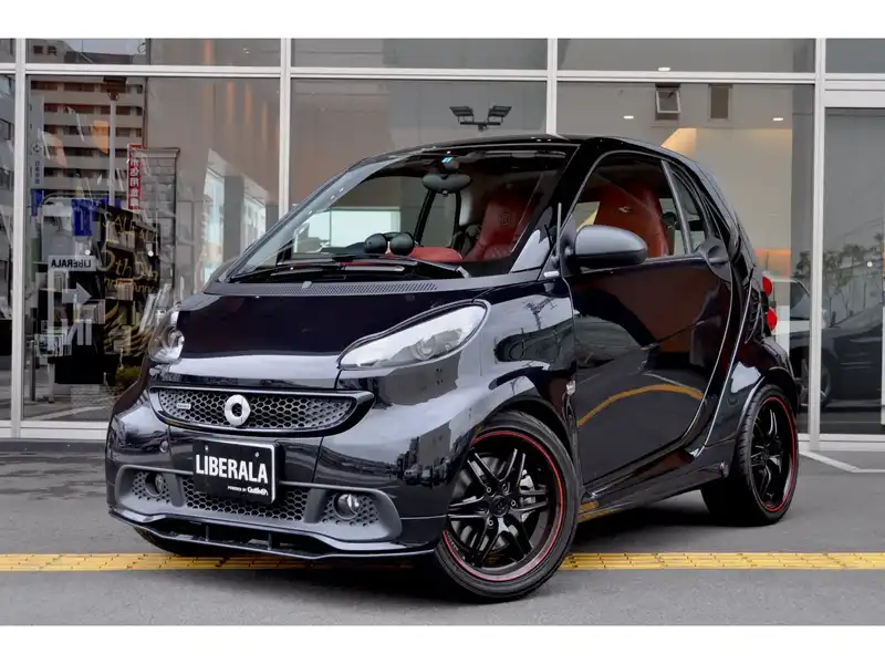 カタログ画像：スマートフォーツークーペ（SMART FORTWO COUPE） ＢＲＡＢＵＳ エクスクルーシブ エディション ミッドナイトブルー 2014年4月 ABA-451333 1000cc ミッドナイトブルー 燃費18.6km / l フロント