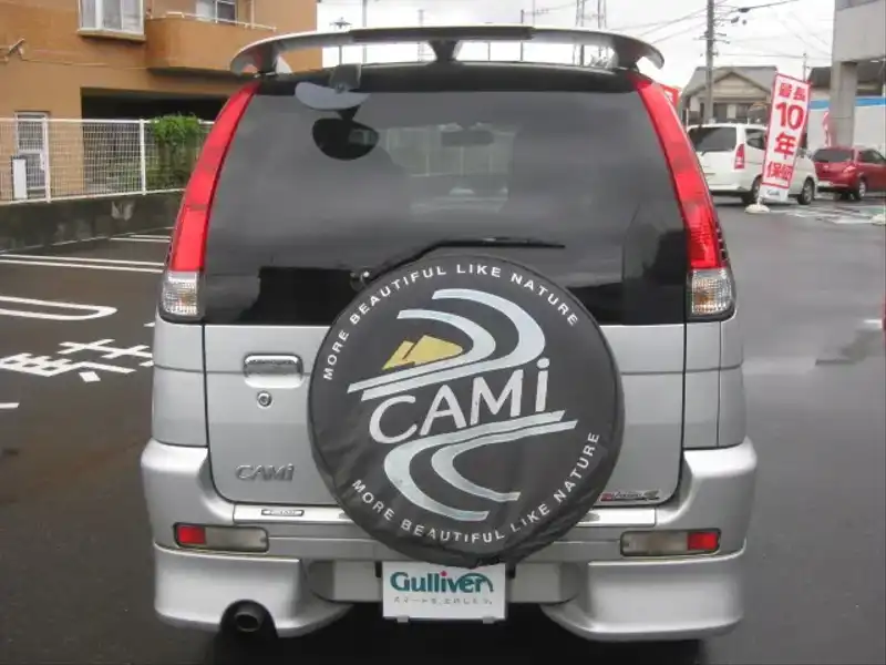 1000078 | カタログ画像：キャミ（CAMI） Ｑ エアロバージョン 2000年8月 GF-J122E 1300cc シルバーメタリック バック