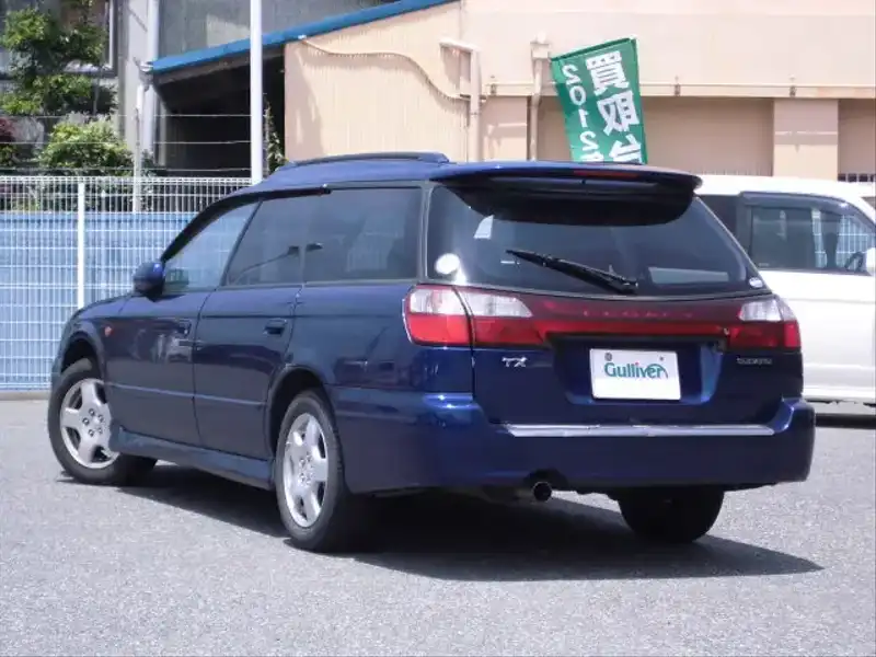 カタログ画像：レガシィツーリングワゴン（LEGACY TOURING WAGON） ＴＸ 1999年5月 GF-BH5 2000cc バイオレットブルー・マイカ 燃費13.6km / l  バック