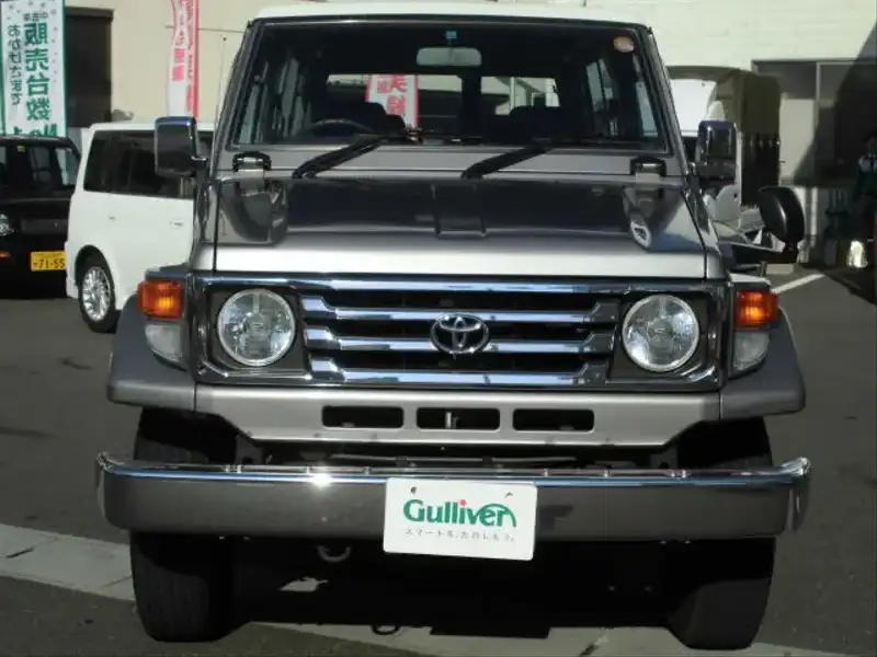 カタログ画像：ランドクルーザー７０（LAND CRUISER 70） ＬＸ ２ドア（ＦＲＰ） 1999年8月 KG-HZJ74V 4200cc グレーメタリック フロント