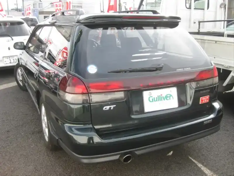 カタログ画像：レガシィツーリングワゴン（LEGACY TOURING WAGON） ＧＴ Ｖリミテッド 1996年2月 E-BG5 2000cc ブラックマイカ 燃費9.4km / l  バック