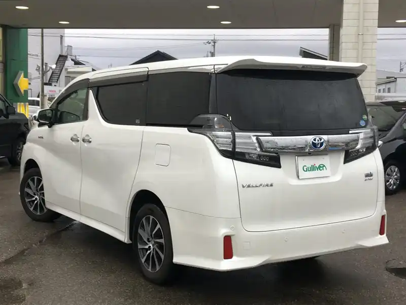 カタログ画像：ヴェルファイアハイブリッド（VELLFIRE HYBRID） ハイブリッドＺＲ 2015年1月 DAA-AYH30W 2500cc ホワイトパールクリスタルシャイン 燃費18.4km / l バック