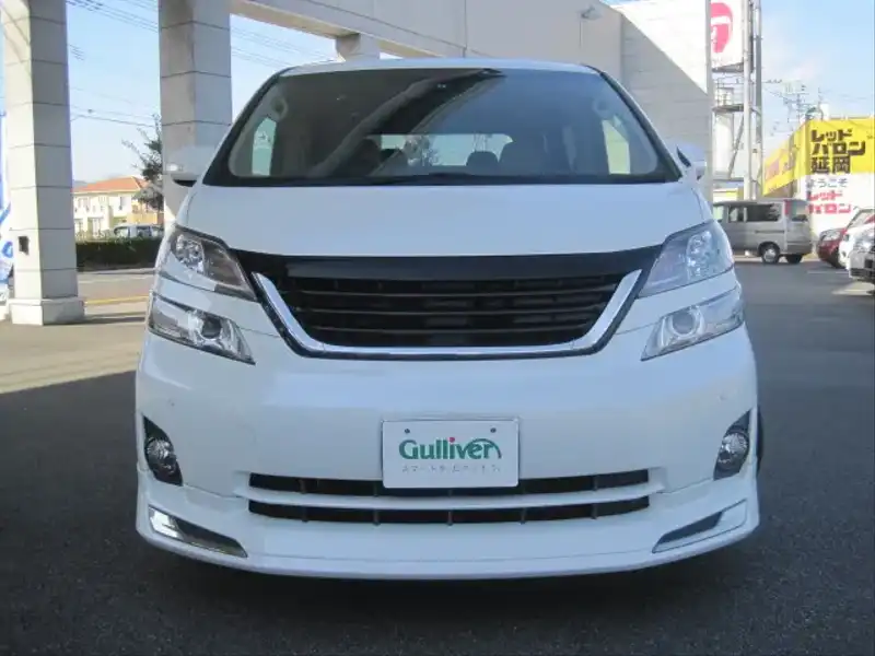 カタログ画像：ヴェルファイア（VELLFIRE） ３．５Ｖ サイドリフトアップシート装着車 2008年5月 DBA-GGH20W 3500cc ホワイトパールクリスタルシャイン 燃費9.5km / l  フロント