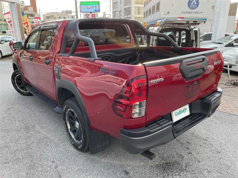 カタログ画像：ハイラックス（HILUX） Ｚ ブラックラリーエディション 2019年6月 QDF-GUN125 2400cc クリムゾンスパークレッドメタリック 燃費11.8km / l バック