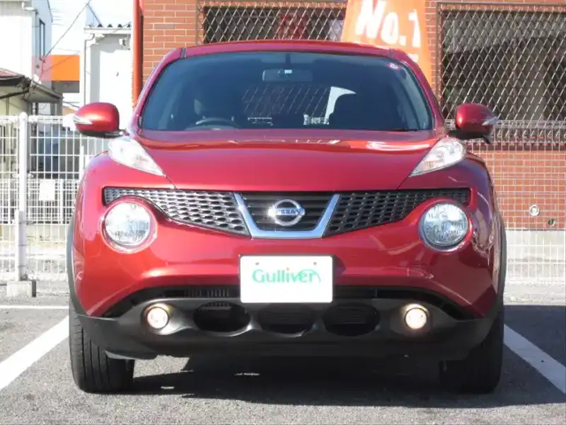 カタログ画像：ジューク（JUKE） １６ＧＴ ＦＯＵＲ 2010年11月 CBA-NF15 1600cc ラディアントレッド（ＰＭ） 燃費12.6km / l フロント