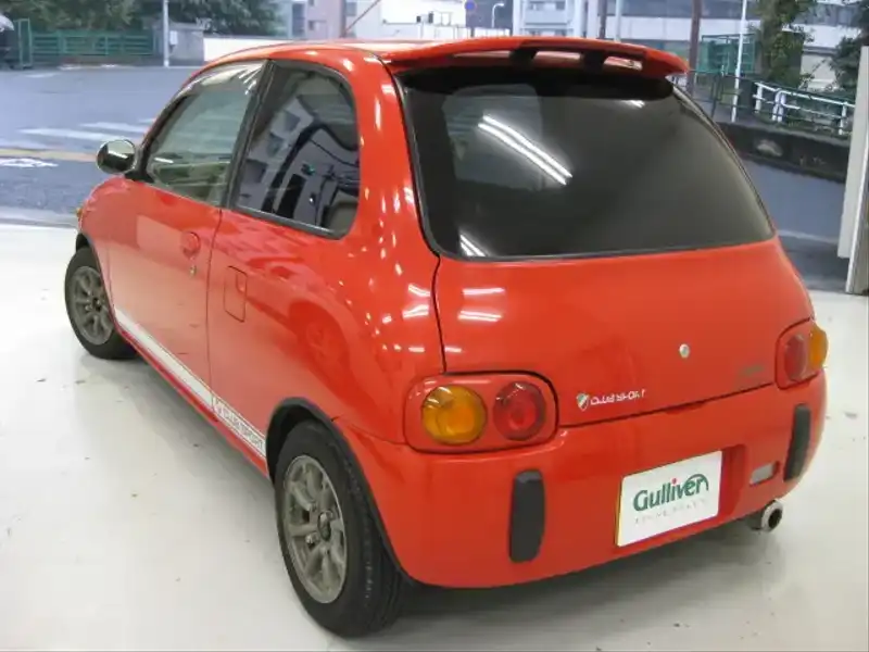 カタログ画像：オプティ（OPTI） クラブスポルト 1997年8月 E-L310S 660cc イタリアンレッド 燃費18.4km / l  バック