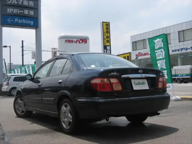 カタログ画像：ブルーバードシルフィ（BLUEBIRD SYLPHY） １８Ｖｉ Ｇパッケージリミテッド 2002年4月 UA-QG10 1800cc エクセレントブルー（Ｐ） 燃費16.0km / l  バック