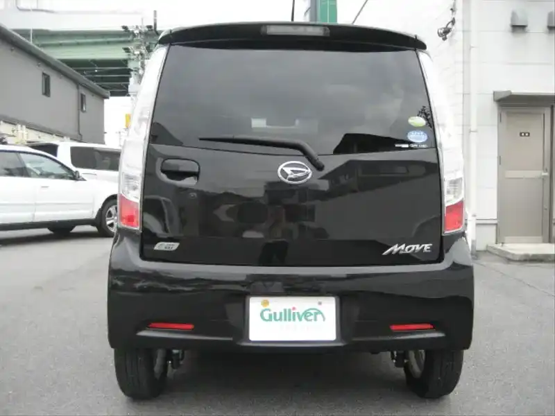 カタログ画像：ムーヴ（MOVE） カスタム Ｇ 2010年12月 DBA-LA100S 660cc ブラックマイカメタリック 燃費27.0km / l  バック