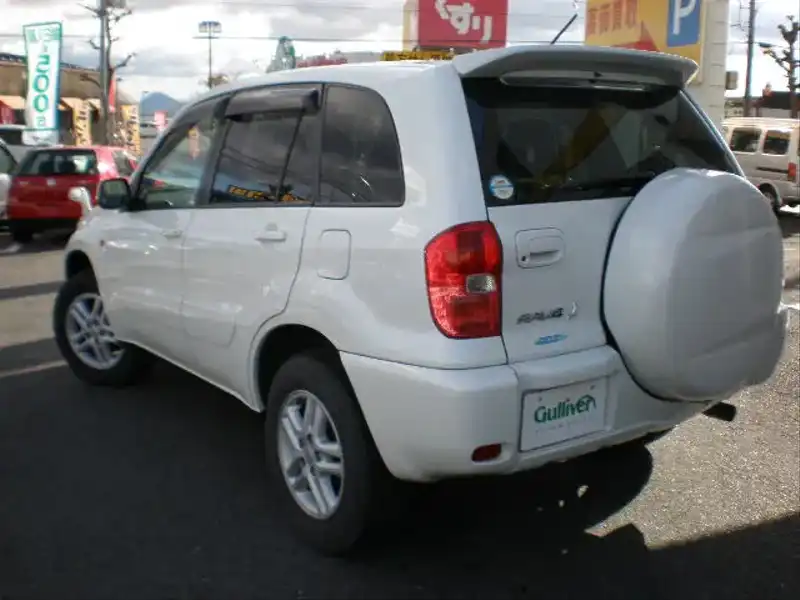 カタログ画像：ＲＡＶ４ Ｊ（RAV4J） Ｘリミテッド 2002年9月 TA-ZCA26W 1800cc ホワイト 燃費14.4km / l  バック