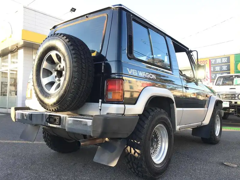 カタログ画像：パジェロ（PAJERO） ワイドメタルトップワゴン スーパーＪＸ－Ｗ 1989年6月 E-L141GW 3000cc ランプブラック／グレースシルバー バック