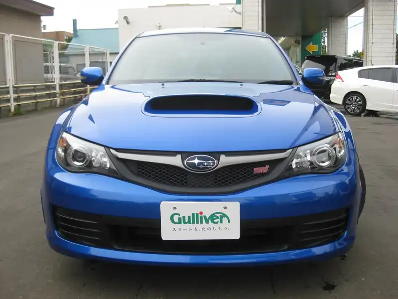 カタログ画像：インプレッサ（IMPREZA） ＷＲＸ ＳＴＩ スペックＣ １８インチタイヤ仕様車 2009年7月 CBA-GRB 2000cc ＷＲブルー・マイカ 燃費10.4km / l  フロント